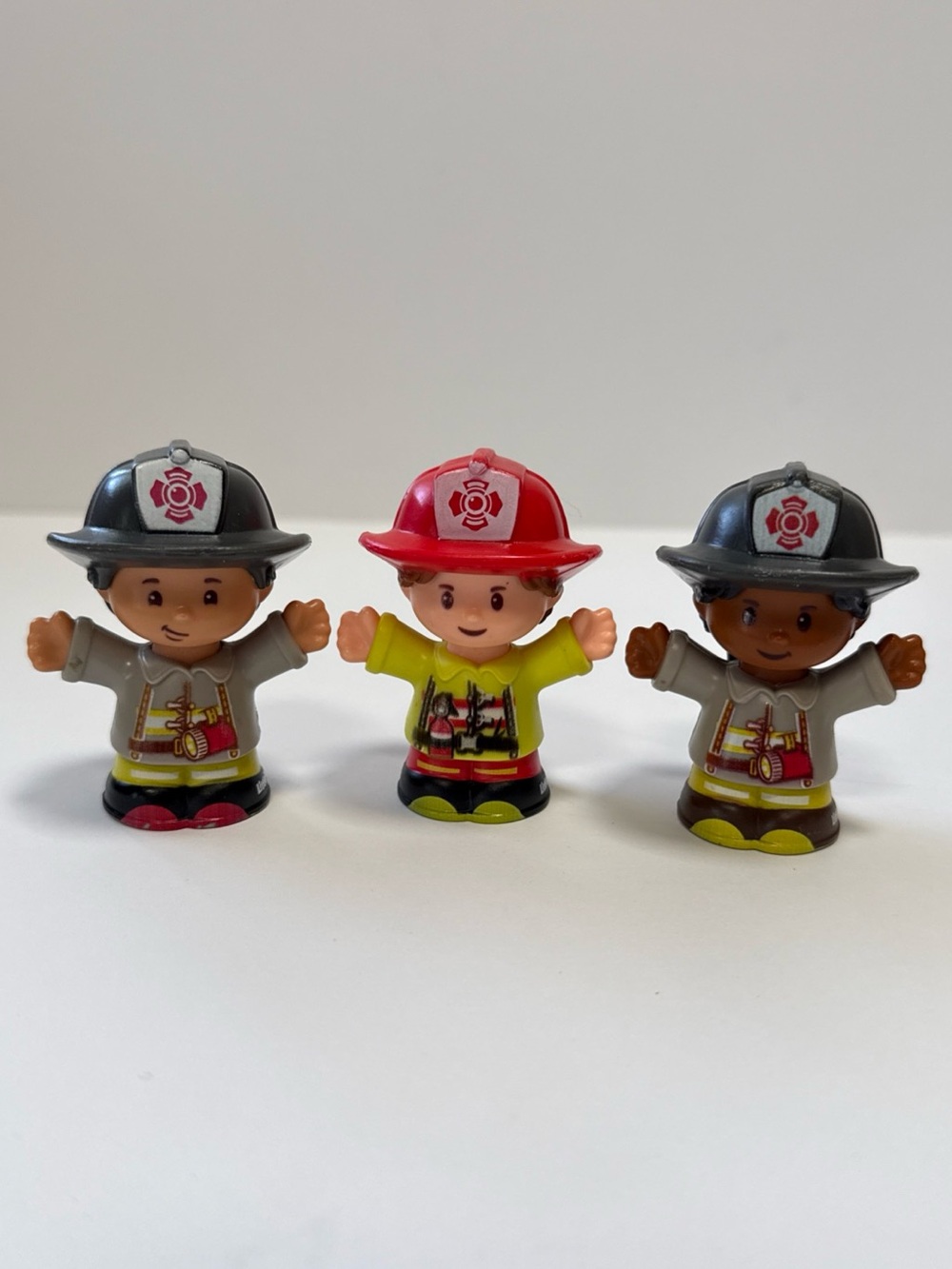 Little people fisher price  Firefighter Figures Set - Red, Black, Yellow